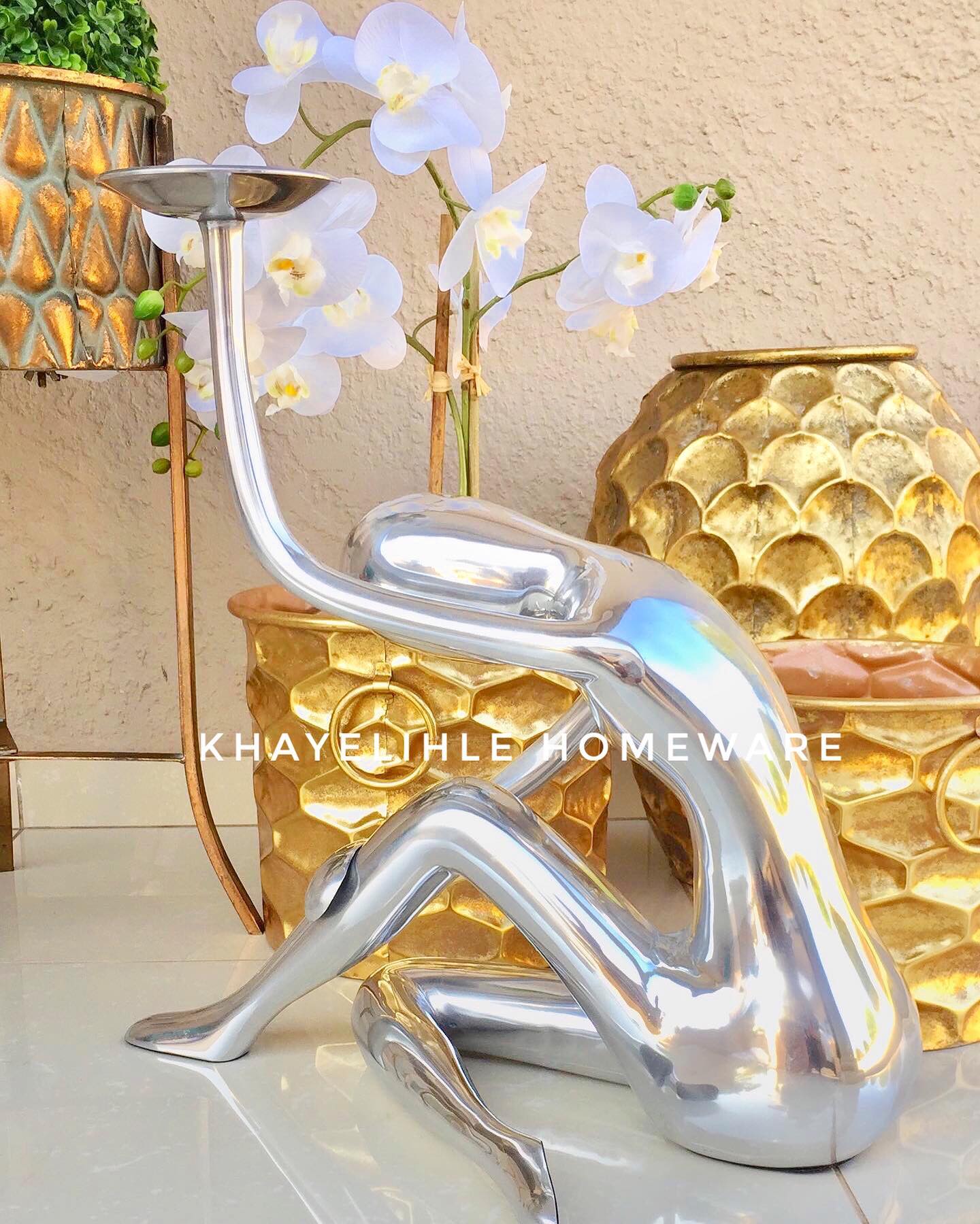 Ndoni raw steel candleholder