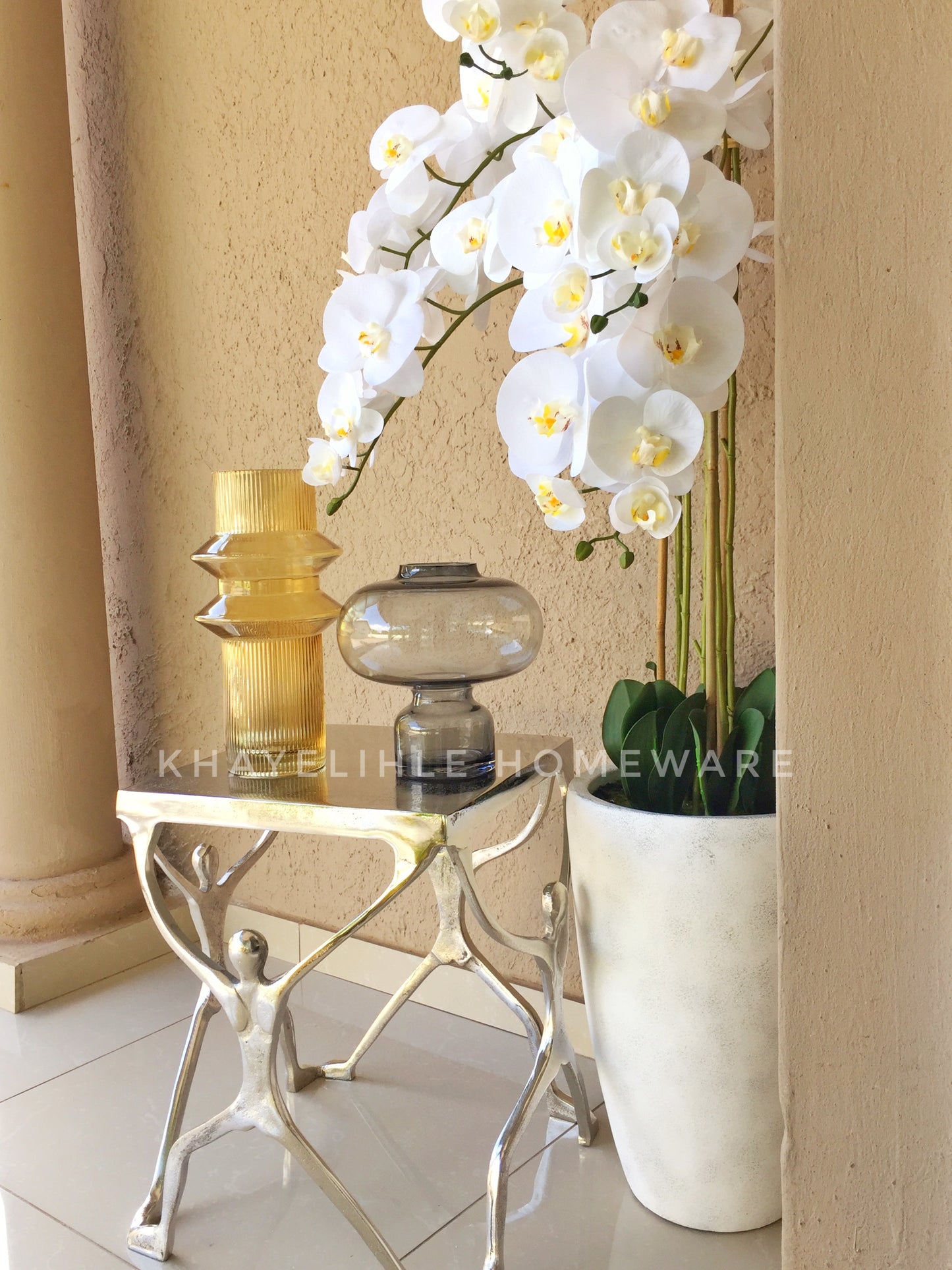 Buhle stainless steel side table